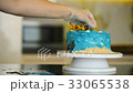 Cake in marine style stands on the table closeup. 33065538