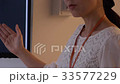 Female presenting 33577229