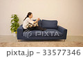 A woman with a smartphone 33577346