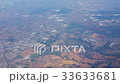 View from the airplane window. Flight over Italy 33633681