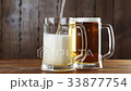 Pouring Beer In The Glass (Mug) 33877754