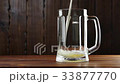Pouring Beer In The Glass (Mug). 33877770
