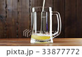 Pouring Beer In The Glass (Mug). 33877772