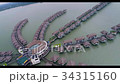 Aerial: Water cottage, panoramic view 34315160