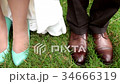 Shoes of bride and groom on a wedding day 34666319