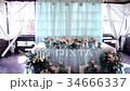 Bride and groom table at a wedding reception 34666337