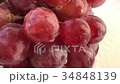 Another view: A lot Red Grapes White background 34848139