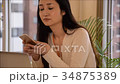 スマホ　スマートフォン　受電　日本の女性 34875389