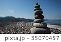 Pyramid  pebbles against the backdrop of mountains 35070457