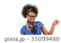 Happy african american woman pointing something 35099480
