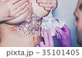 Tattoo artist removes the sketch from the body 35101405