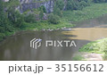 A group of people rafts along the river 35156612