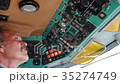 The worker checks the control panel of the 35274749