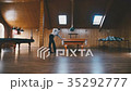 Man plays billiards 35292777