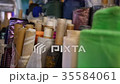 Spools of Shiny Fabric Closeup 35584061