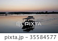 Silhouette of Boat at Sunset 35584577