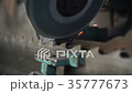 Circular saw working process close-up 35777673