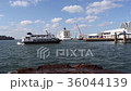 A view of the harbor with a view of a ship leaving to Korea and a cruise liner anchored in Fukuoka, Fukuoka City 36044139