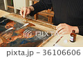 Artist Working in the Studio Restores the Icon 36106606