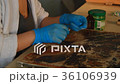 Artist Working in the Studio Restores the Icon 36106939