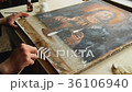 Artist Working in the Studio Restores the Icon 36106940
