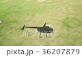 The video is taken from the shadow of a helicopter 36207879