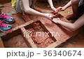 Children learn to make brick from the traditional. 36340674