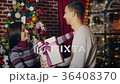Man gives Christmas gift 36408370