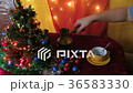 Woman drinking natural coffee on Christmas Eve 36583330