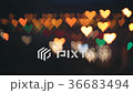 The colorful blurred lights in shape of hearts.  36683494