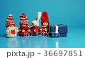 Animated characters open a gift with surprise. 36697851