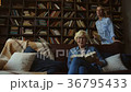 Positive elderly woman spending time with her 36795433