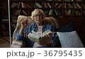 Pleasant elderly woman sharing her wisdom 36795435