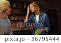 Senior mother and her daughter daughter having a 36795444
