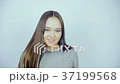 Beautiful young woman with lenses in her eyes 37199568