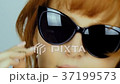 The red-haired model turns on the camera. Hair 37199573