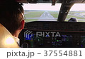 Pilot approaching the runway and landing 37554881