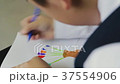 Child at school drawing and writing 37554906