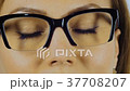 Close-up of a woman's eyes in glasses for sight. 37708207