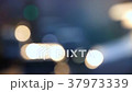 Defocused Blurred City Traffic Lights. Moving Cars 37973339