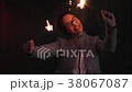 Portrait of a happy teenager holding sparklers in 38067087