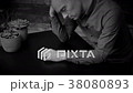 Very sad man at table black and white version 38080893