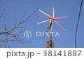 Wind Turbine Start Rotation, Green Energy on Blue 38141887