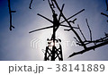 Wind Turbine with Hand Silhouetted by the Sun in B 38141889
