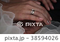 Newlyweds hands close-up 38594026