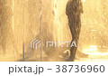 Children play in a city fountain 38736960