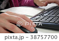 Typing on Keyboard CLOSE UP. Woman fingers working 38757700