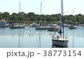 Sailboats moored with flag in the background 38773154