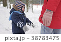 Cute little boy and young mother play in the 38783475