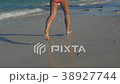 SLOW MOTION Running athletic thin girl sea coast 38927744
